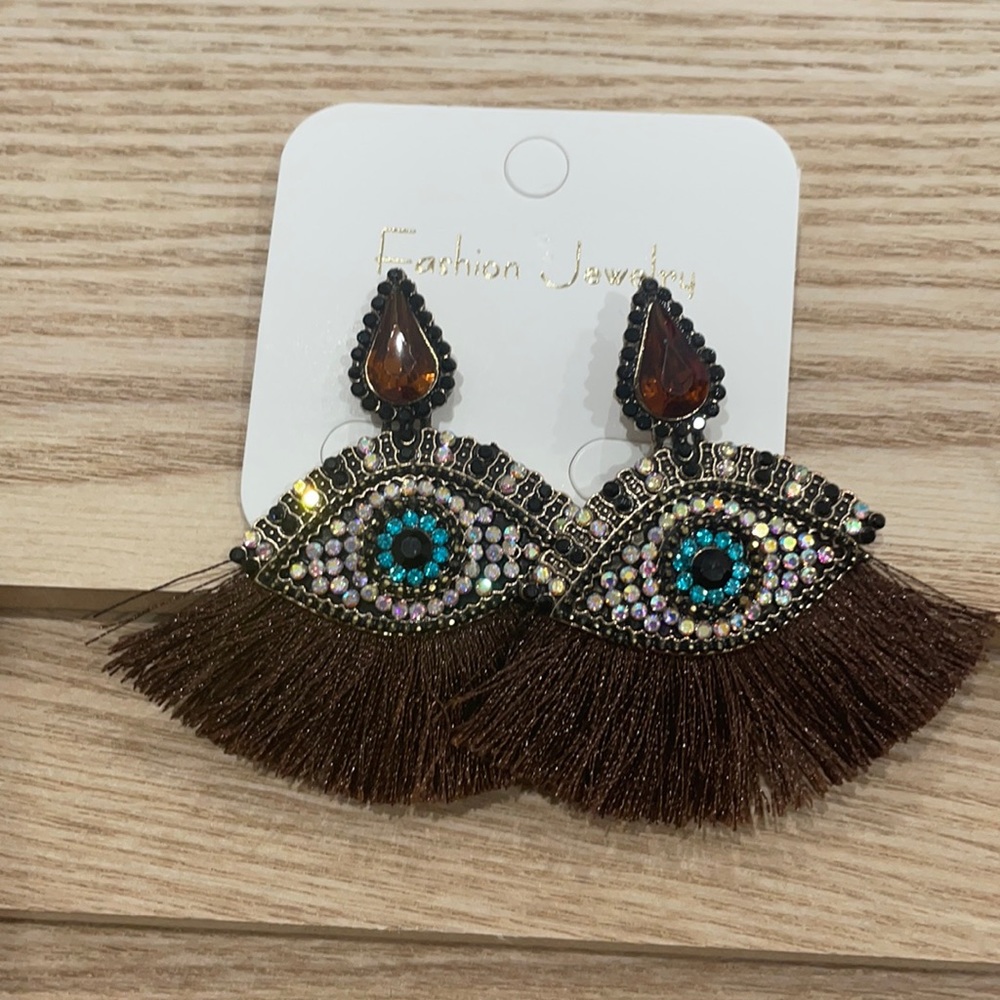 Brown evil eye statement earrings